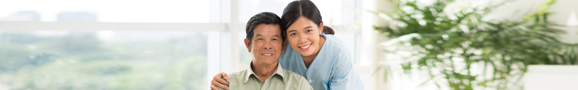 medical staff and eldery person smiling
